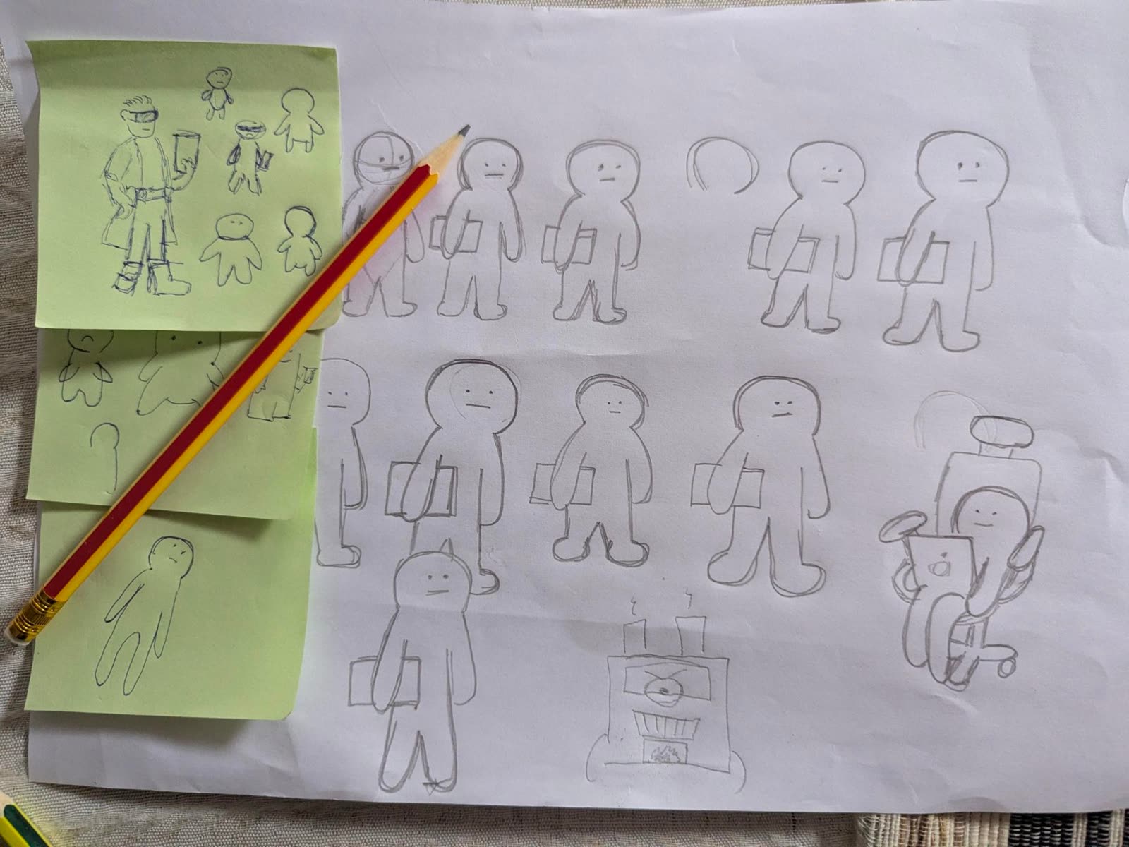 Sketches of the engineer holding a laptop.