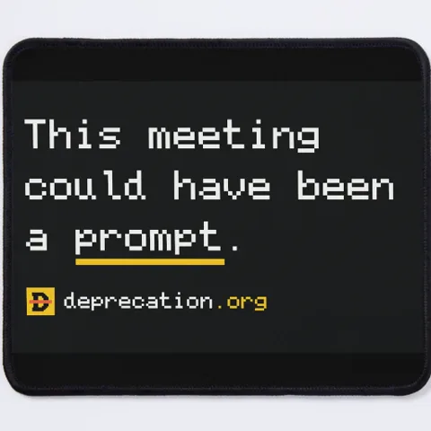 Mousepad printed with “This meeting could have been a prompt.”