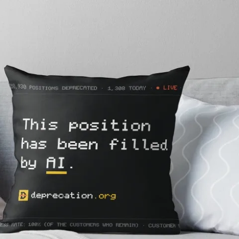 Throw pillow printed with “This position has been filled by AI.”